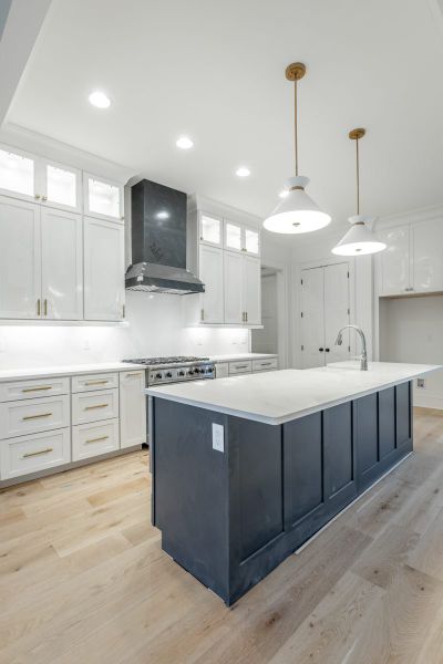 Representative furnished interior of a home built from the Carolina A by Riverstone Construction, LLC in Jasper Highlands, Guild (Image 10).