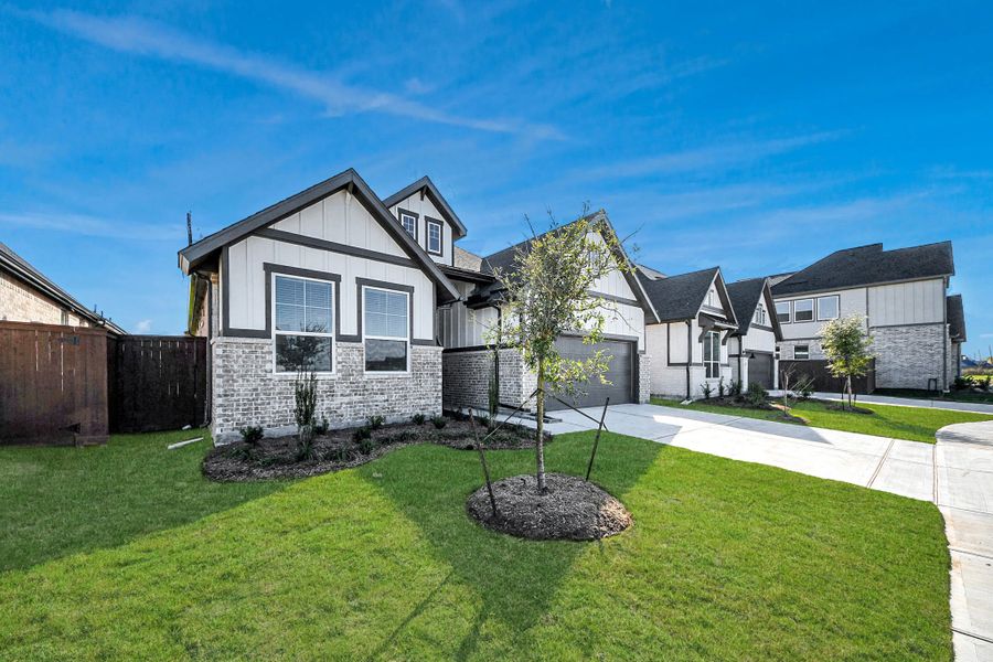 Front exterior of a new home in Beacon Point, Texas City, TX, highlighting curb appeal (Image 29).