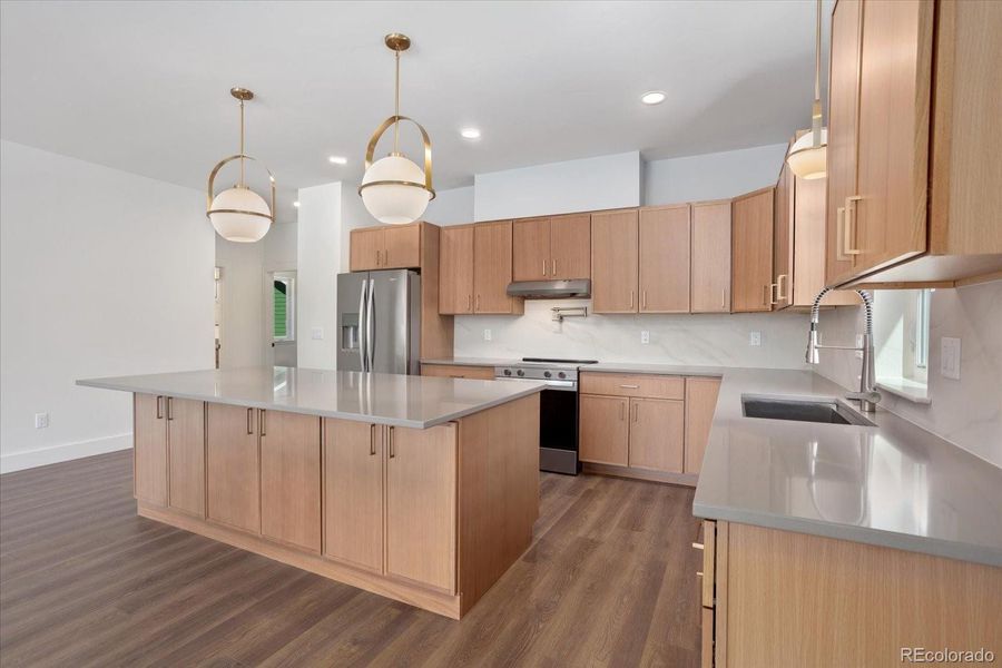 Gracious countertop space and ample cabinet space