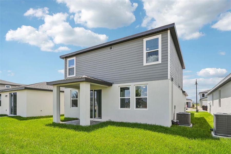 Exterior details and patio area of a home in Crosswinds - Classic Series, Haines City (Image 23).