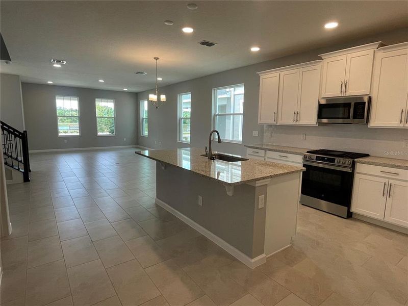 Furnished interior view inside a new home in Center Lake on the Park, St. Cloud (Image 16).