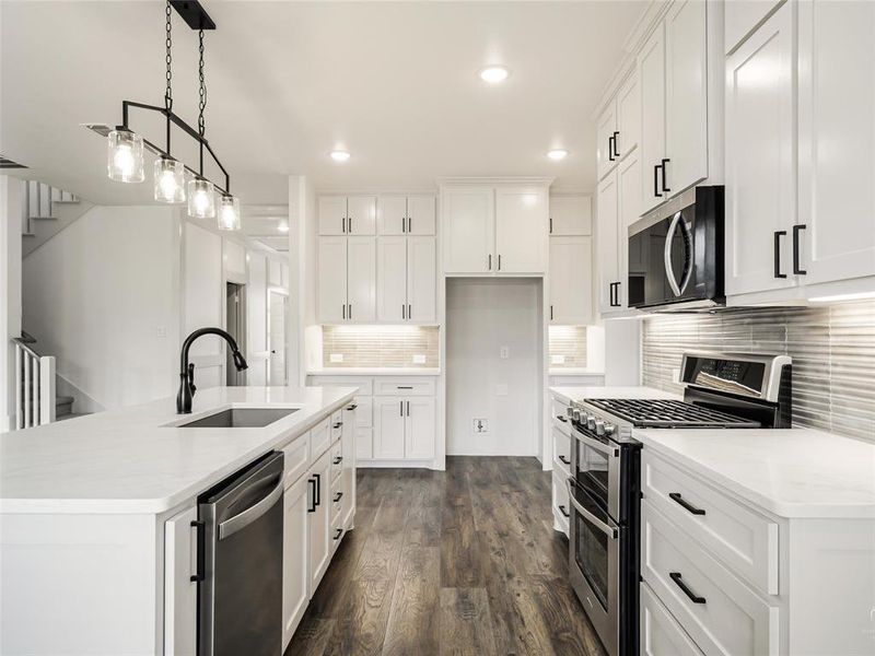 Stainless steel appliances, built-in microwave, gas range with double oven. Stainless steel appliances, built-in microwave, gas range with double oven.
