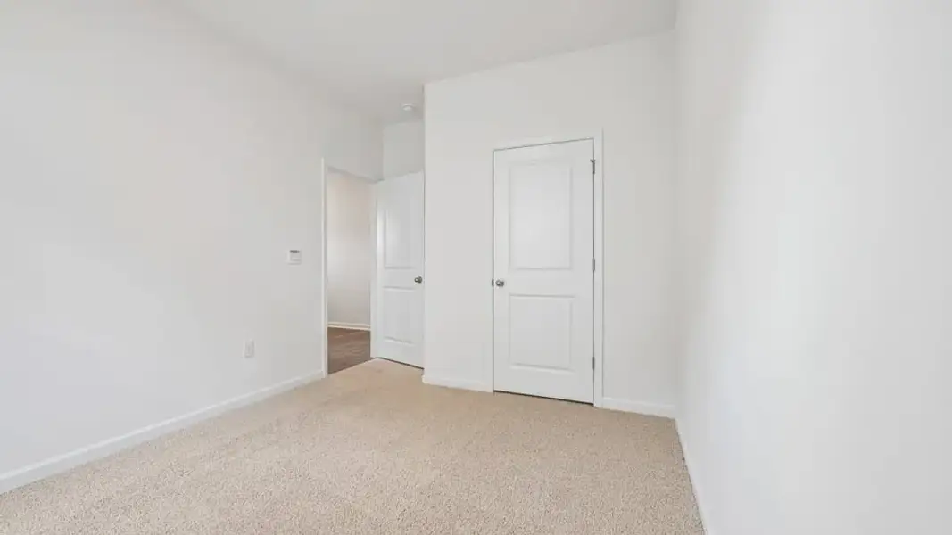 Spacious, unfurnished interior of a new home in The Villas at Laurel Oaks, Sanford (Image 16).