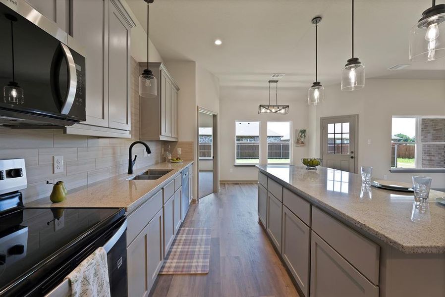 Energy-efficient stainless-steel appliances, oversized island and LOTS of cabinet space! Energy-efficient stainless-steel appliances, oversized island and LOTS of cabinet space!