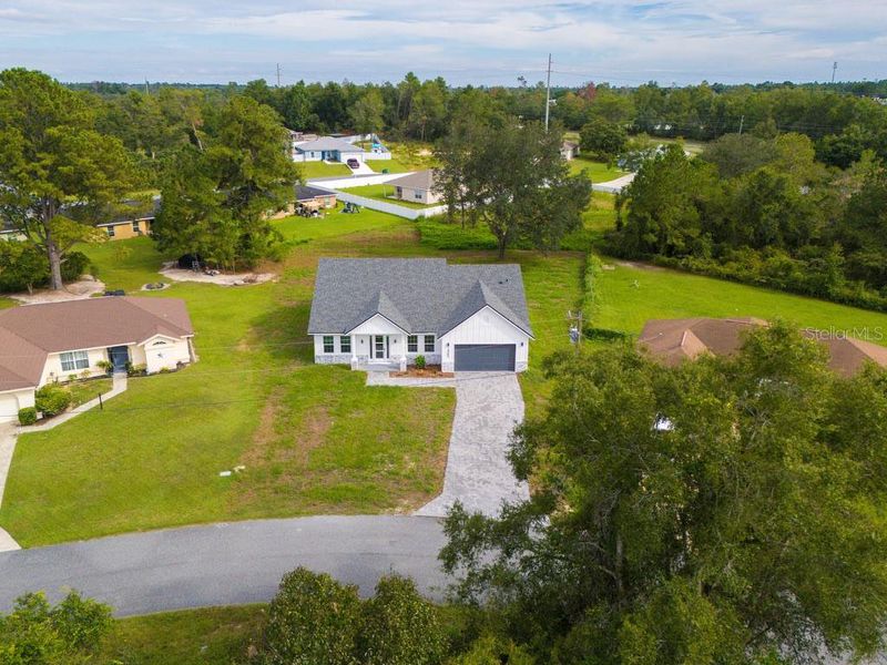 Front exterior of a new home in , Ocala, FL, highlighting curb appeal (Image 20).