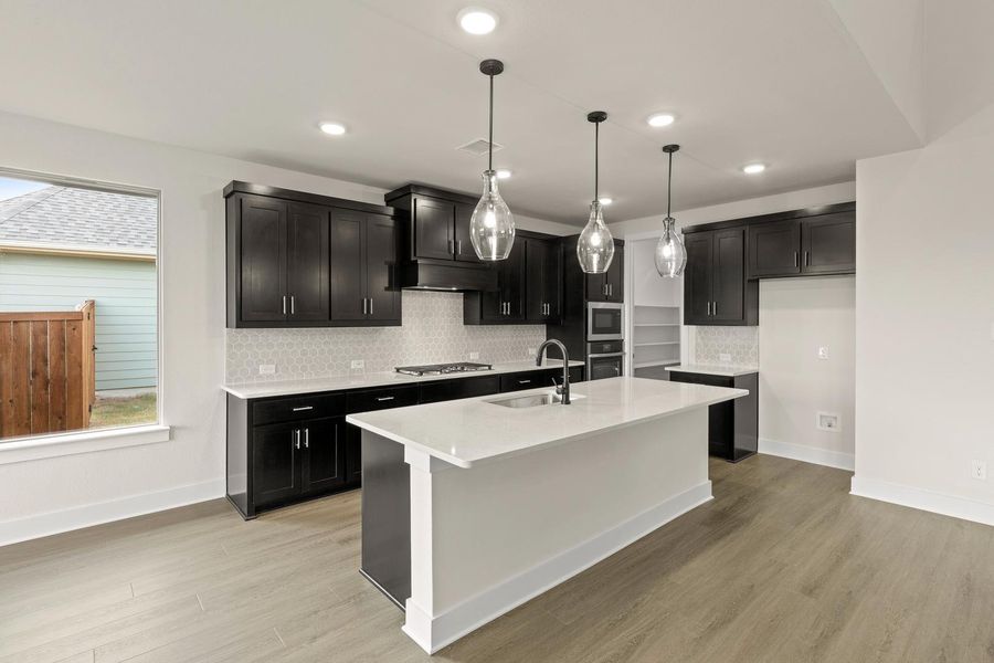 Representative furnished interior of a home built from the Davis by Tri Pointe Homes in Somerset Park, Rockwall (Image 6).