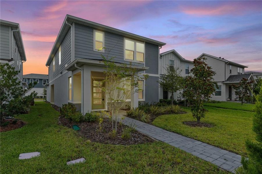 Exterior details and patio area of a home in EverBe, Orlando (Image 23).