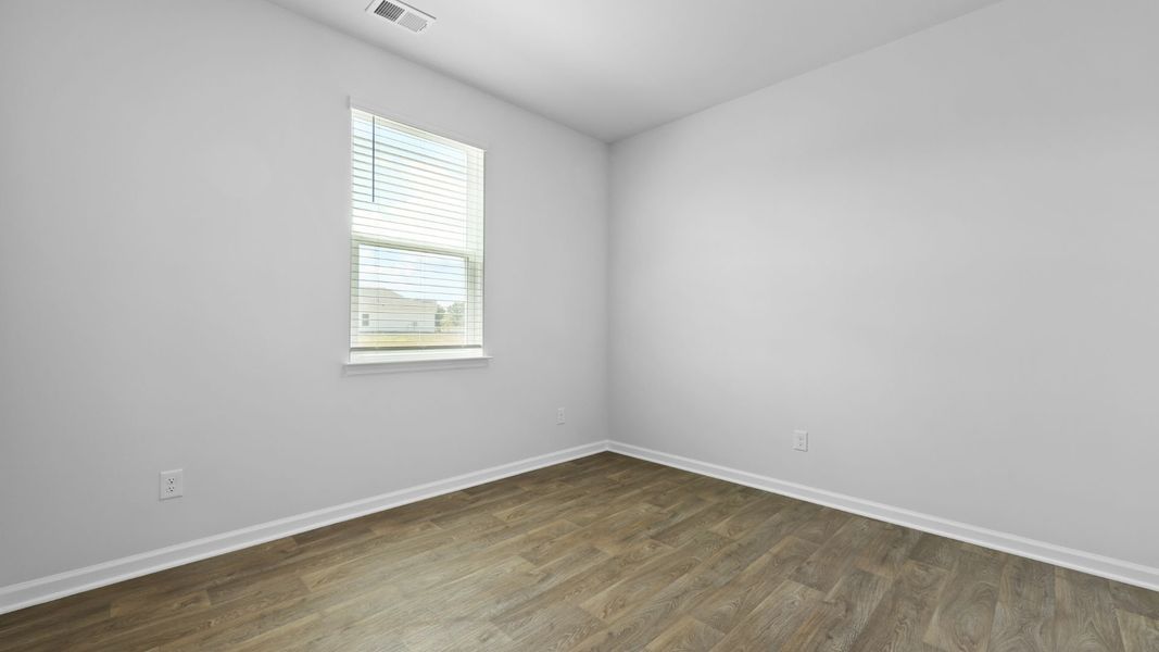Spacious, unfurnished interior of a new home in Pine Hills at Cane Bay, Summerville (Image 23).