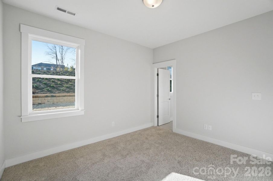 Spacious, unfurnished interior of a new home in Rone Creek, Waxhaw (Image 43).