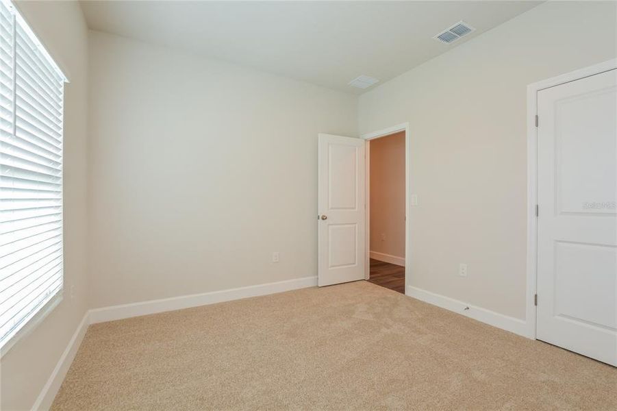 Spacious, unfurnished interior of a new home in , North Port (Image 32).
