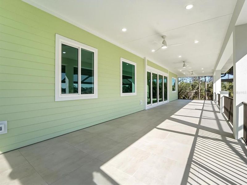 Exterior details and patio area of a home in , Englewood (Image 39).
