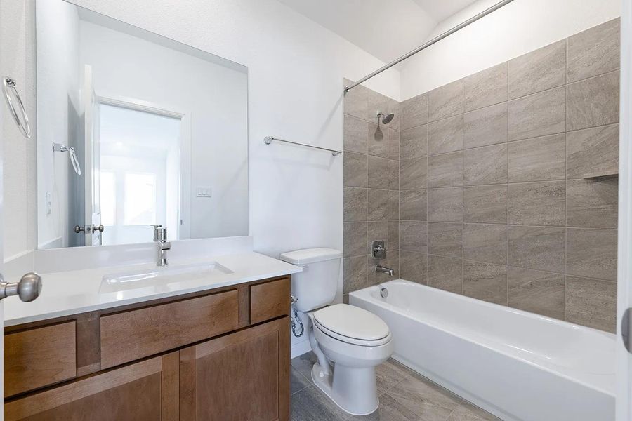 Furnished interior view inside a new home in The Colony - 45', Bastrop (Image 6).