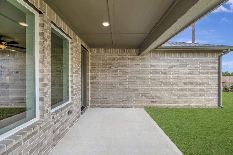 Exterior details and patio area of a home in The Grand Prairie - Meadow Collection, Hockley (Image 4). Exterior details and patio area of a home in The Grand Prairie - Meadow Collection, Hockley (Image 4).