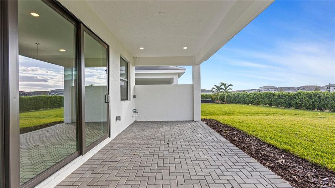 Exterior details and patio area of a home in Cresswind Lakewood Ranch, Lakewood Ranch (Image 4).