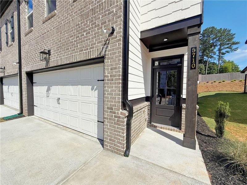 Front exterior of a new home in , Tucker, GA, highlighting curb appeal (Image 2).