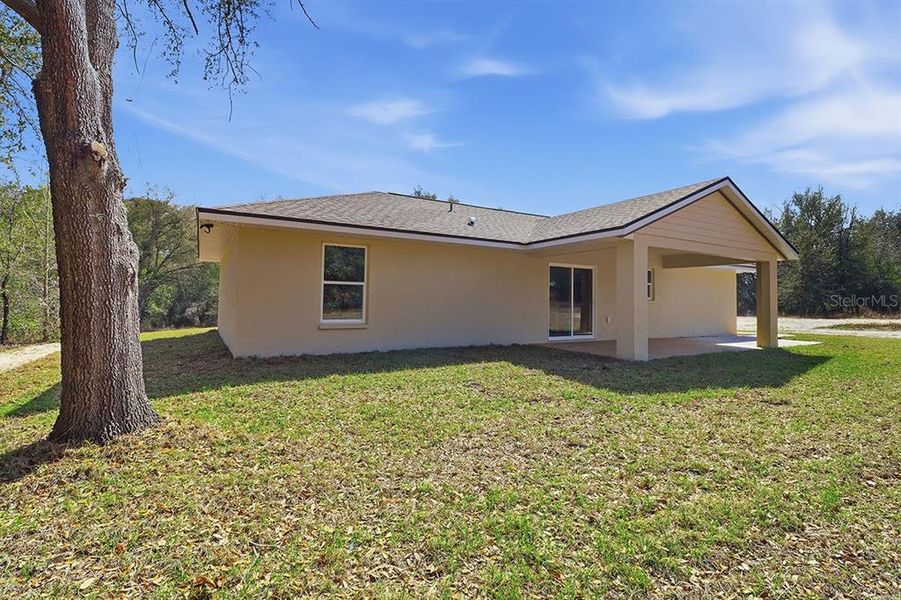 Exterior details and patio area of a home in , Citrus Springs (Image 21).