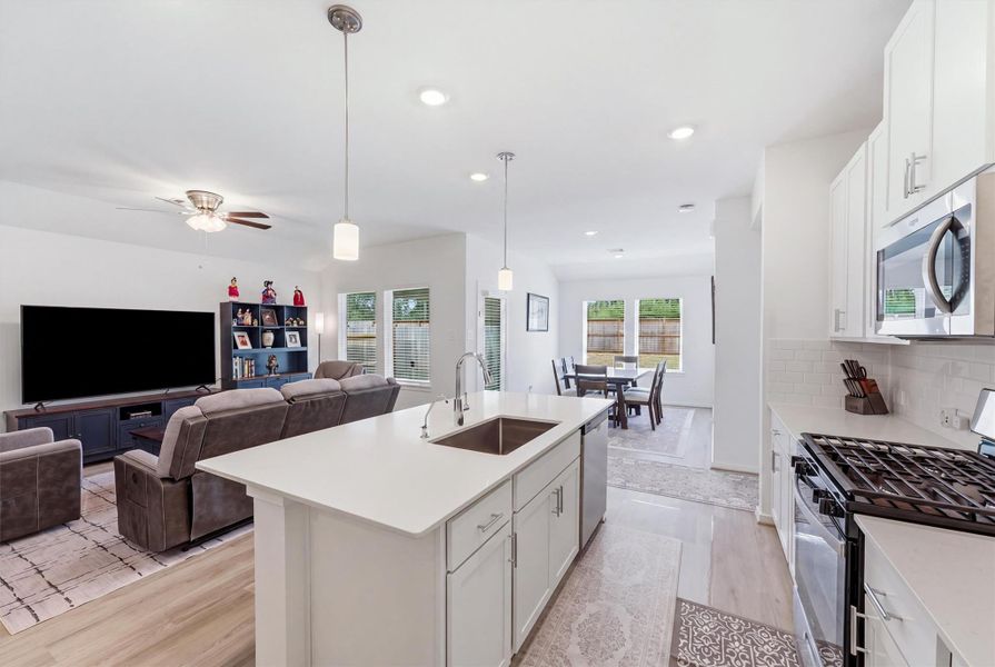 Open concept - kitchen over looks living room and dining room Open concept - kitchen over looks living room and dining room