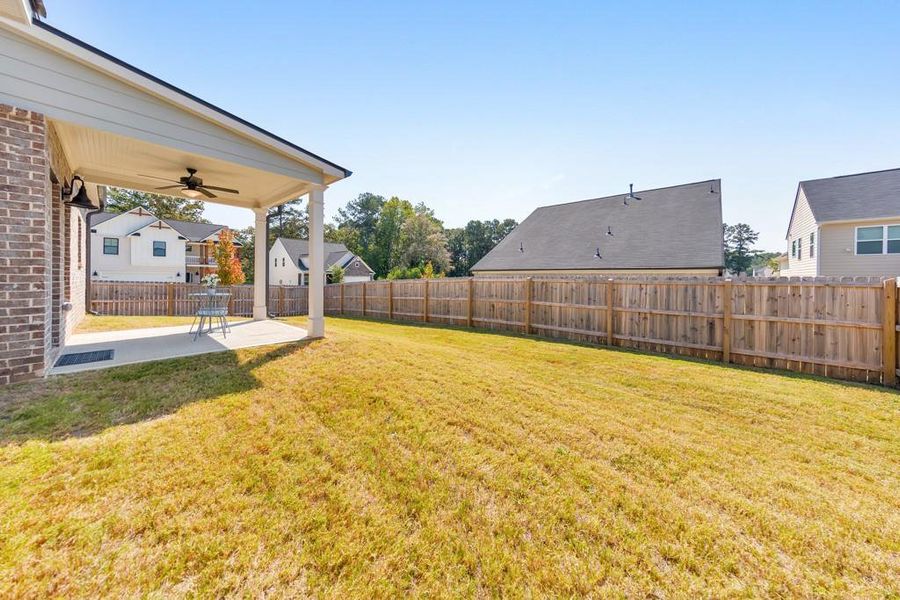 Front exterior of a new home in , Powder Springs, GA, highlighting curb appeal (Image 24).