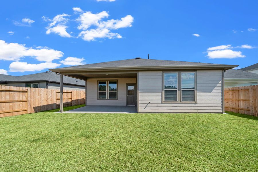 Exterior details and patio area of a home in Crosby Farms, Crosby (Image 3).