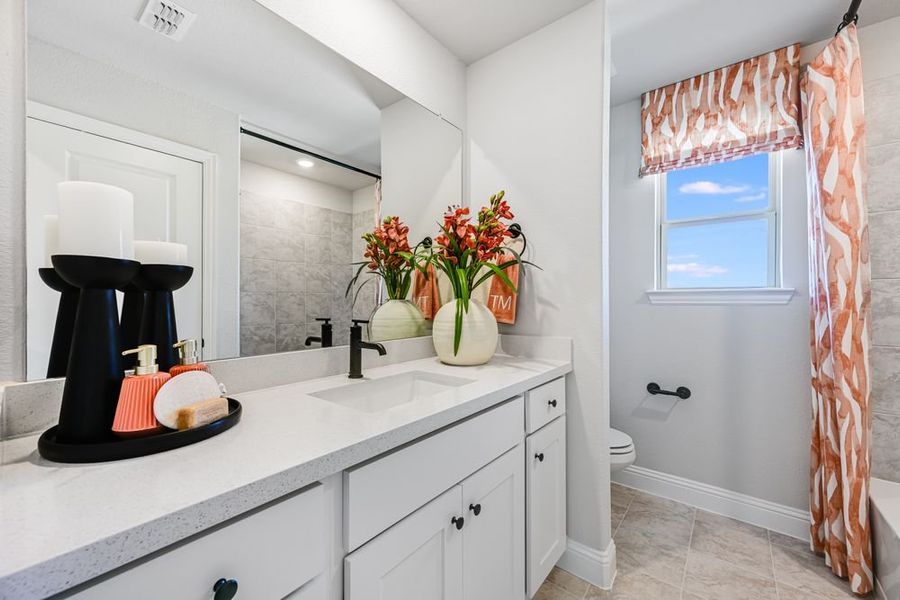 Furnished interior view inside a new home in Highland Lakes 50s, McKinney (Image 16).
