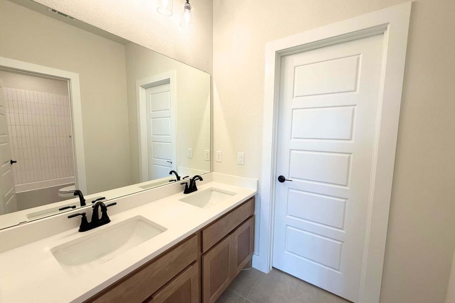 Furnished interior view inside a new home in Feathergrass, Georgetown (Image 17).