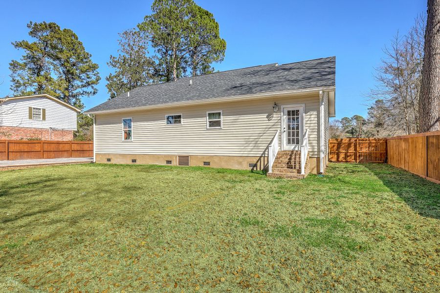 Exterior details and patio area of a home in , Holly Hill (Image 28). Exterior details and patio area of a home in , Holly Hill (Image 28).