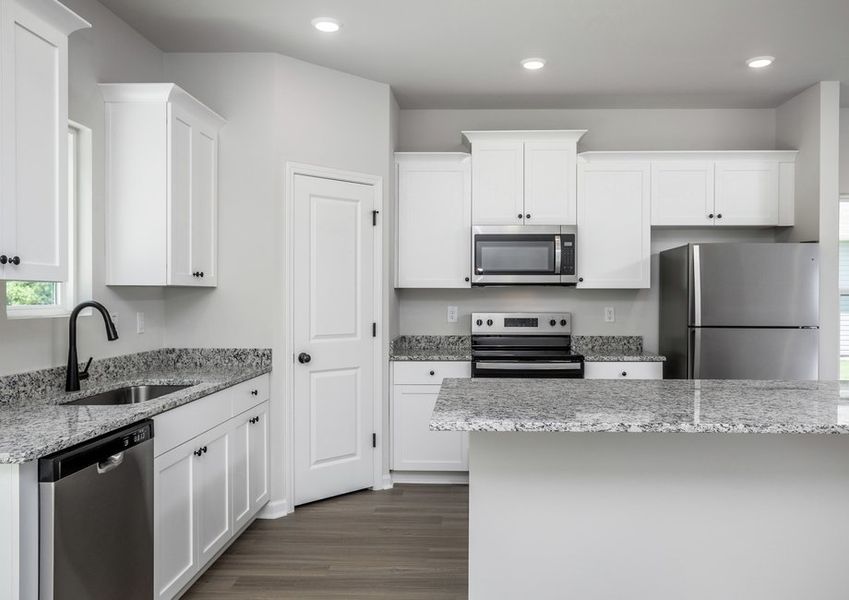 The kitchen has granite countertops. The kitchen has granite countertops.
