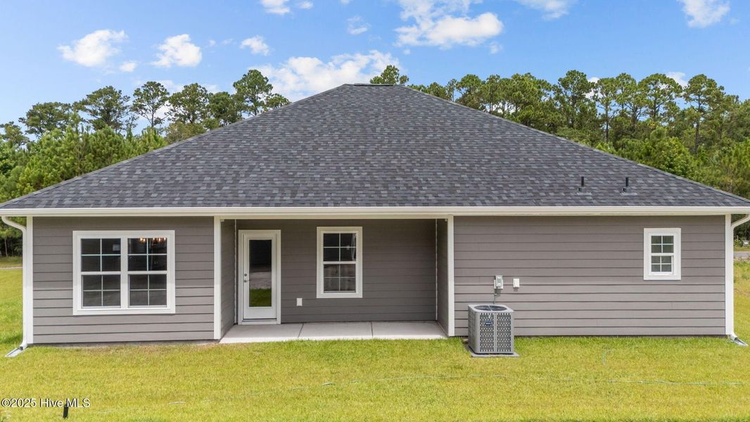 Front exterior of a new home in Rutledge, Shallotte, NC, highlighting curb appeal (Image 16).