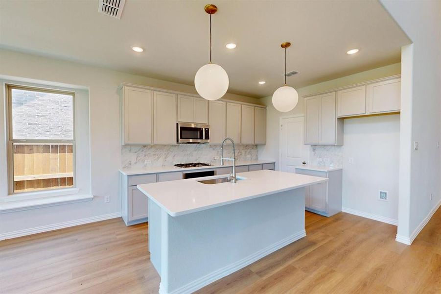 Furnished interior view inside a new home in Lilybrooke at Legacy Hills, Celina (Image 7).