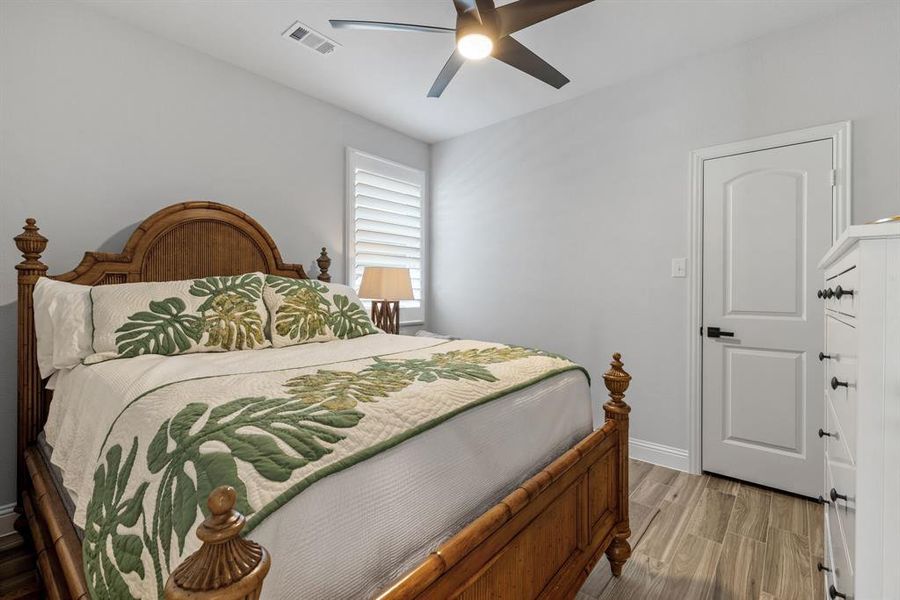 Bedroom featuring light wood-type flooring and ceiling fan