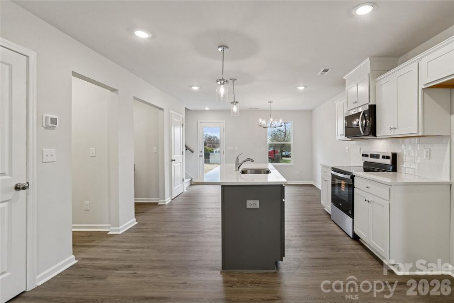 Furnished interior view inside a new home in , Statesville (Image 7).
