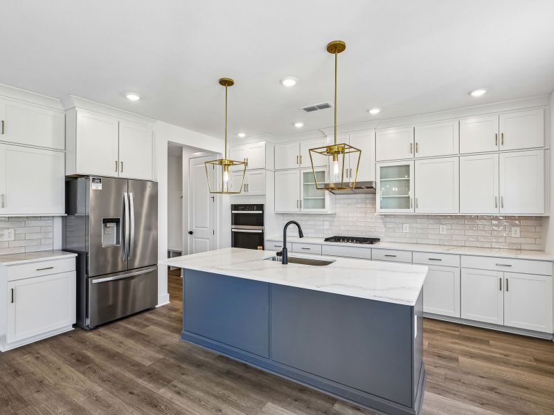 Furnished interior view inside a new home in Station Hill - Estate Series, Franklin (Image 4).