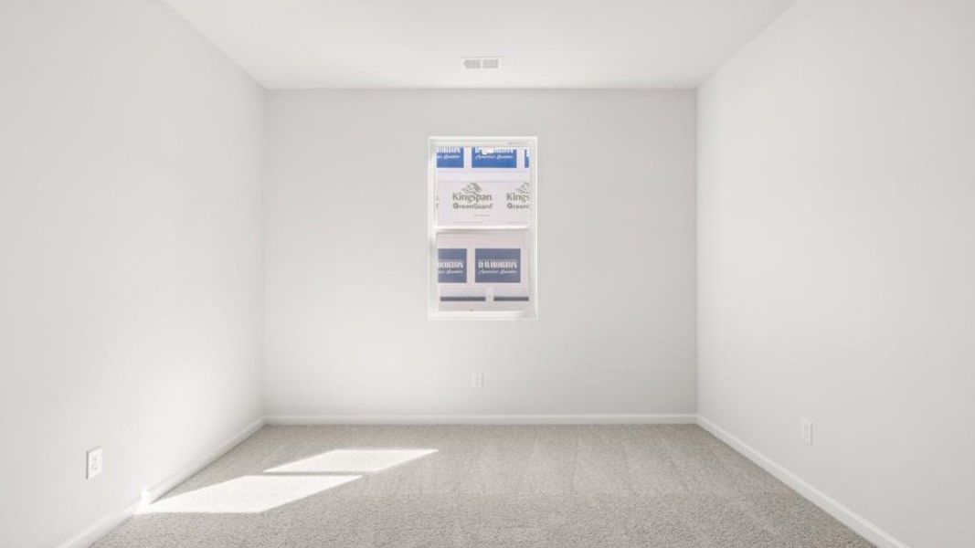 Spacious, unfurnished interior of a new home in South Wind, Fairburn (Image 13).