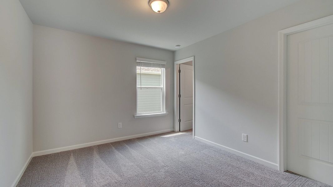 Representative furnished interior of a home built from the Emma by DRB Homes in Enclave at Evergreen, Fairburn (Image 9).