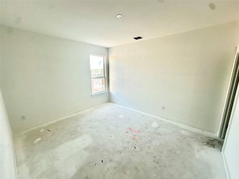 Unfurnished room with concrete floors