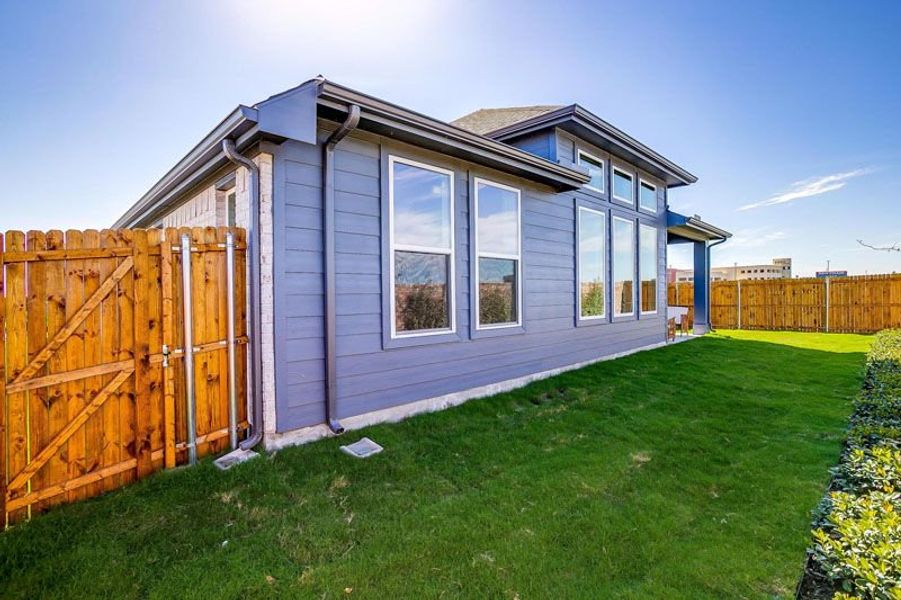 Exterior details and patio area of a home in Creekside, Royse City (Image 4).