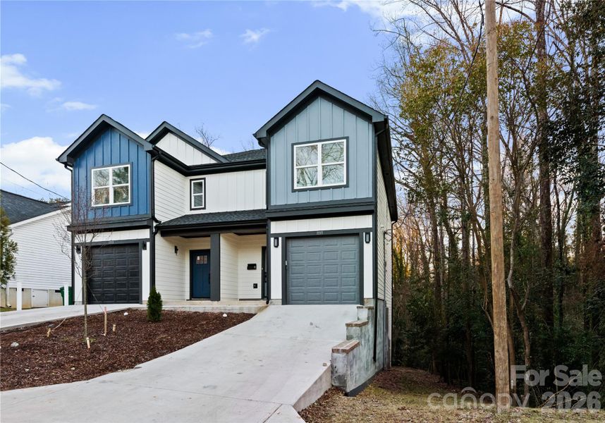 Front exterior of a new home in , Charlotte, NC, highlighting curb appeal (Image 2). Front exterior of a new home in , Charlotte, NC, highlighting curb appeal (Image 2).