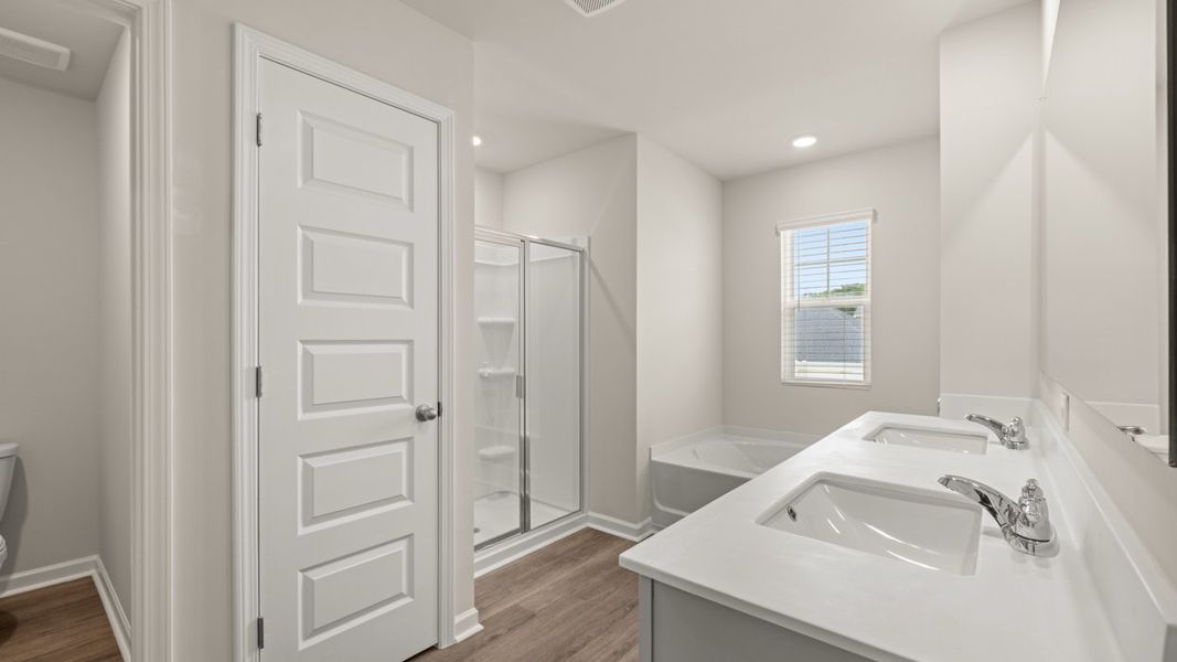 Furnished interior view inside a new home in Preserve at Dove Creek, Statham (Image 10).