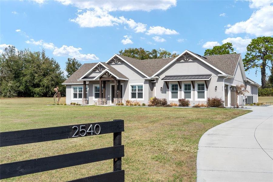Front exterior of a new home in , Oxford, FL, highlighting curb appeal (Image 19).