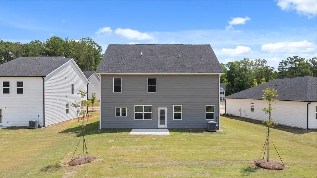 Exterior details and patio area of a home in Oakchase at Hampton, Hampton (Image 4).