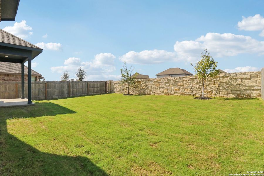 Exterior details and patio area of a home in Arcadia Ridge - Classic Series, San Antonio (Image 24). Exterior details and patio area of a home in Arcadia Ridge - Classic Series, San Antonio (Image 24).