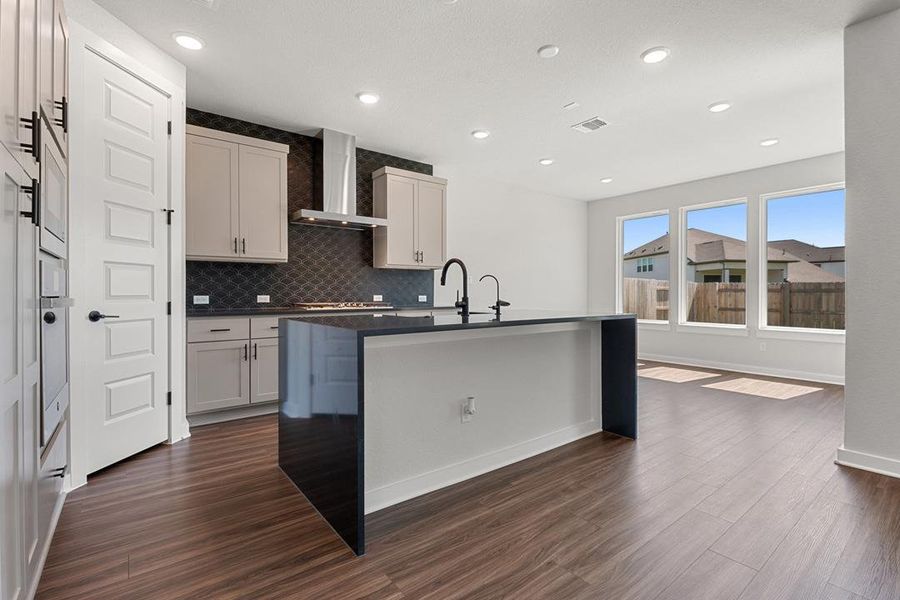Furnished interior view inside a new home in Terrace Collection at Lariat, Liberty Hill (Image 3). Furnished interior view inside a new home in Terrace Collection at Lariat, Liberty Hill (Image 3).