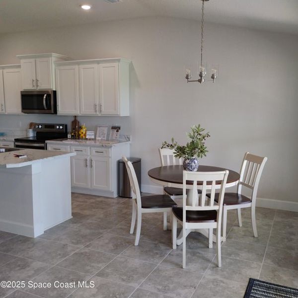 Furnished interior view inside a new home in Courtyard at Waterstone, Palm Bay (Image 6). Furnished interior view inside a new home in Courtyard at Waterstone, Palm Bay (Image 6).