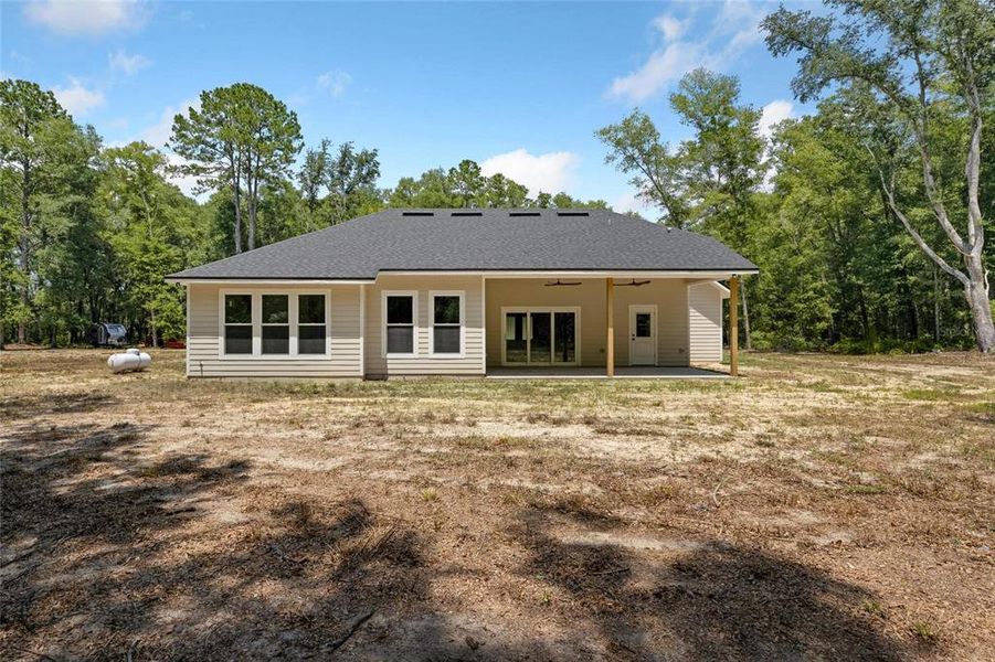 Exterior details and patio area of a home in , Alachua (Image 31).