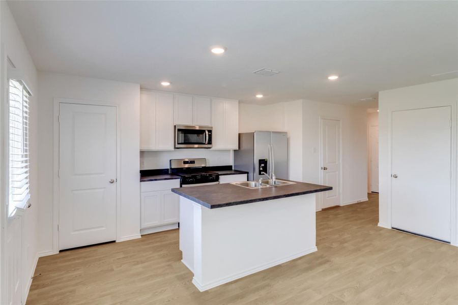 Furnished interior view inside a new home in Prairie Lakes, Buda (Image 7). Furnished interior view inside a new home in Prairie Lakes, Buda (Image 7).