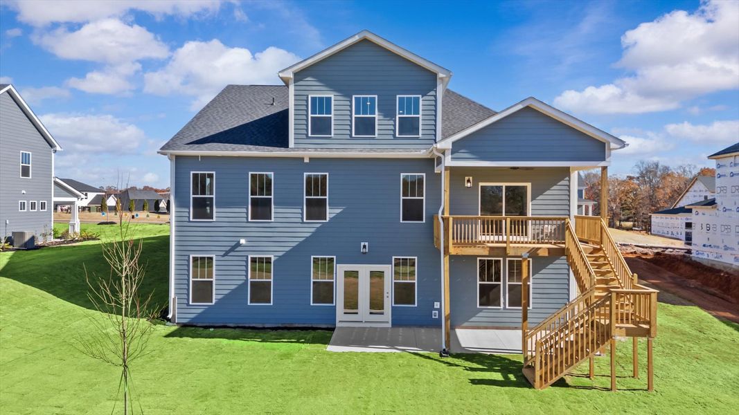 First-class design featuring a rear covered porch and tasteful architectural details