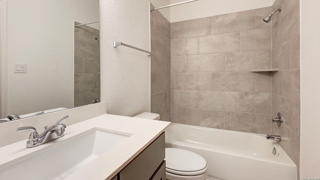 Furnished interior view inside a new home in Ladera, San Antonio (Image 12).