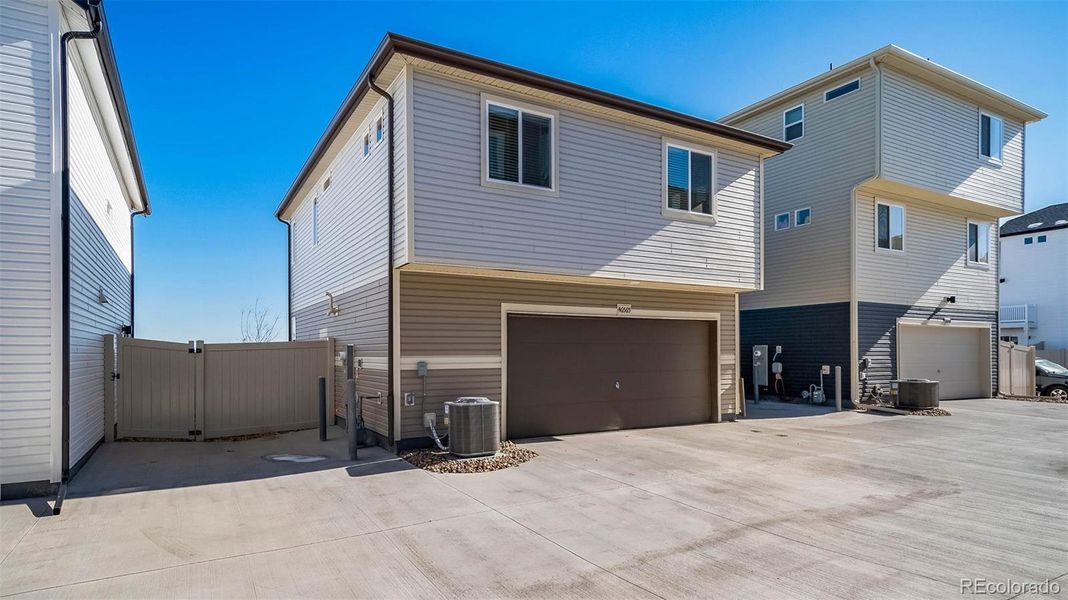 Exterior details and patio area of a home in Muegge Farms, Bennett (Image 23).