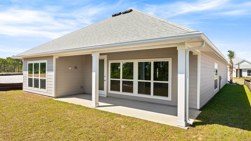 Exterior details and patio area of a home in WindMark Beach, Port Saint Joe (Image 3).