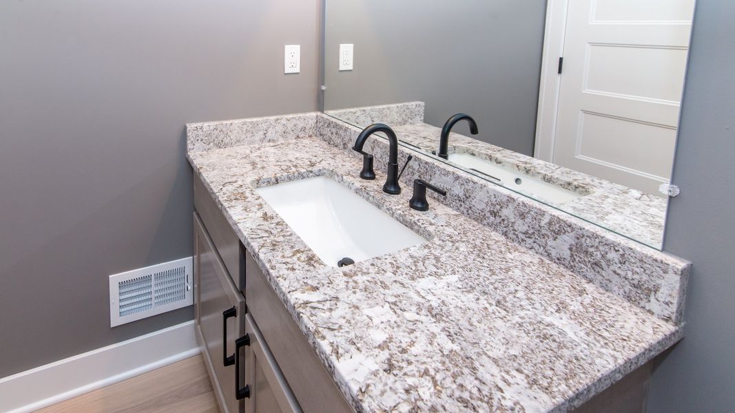 Representative interior finishes for a home built from the The Chesterfield by Norfolk Homes in Valleys, Jackson (Image 22).